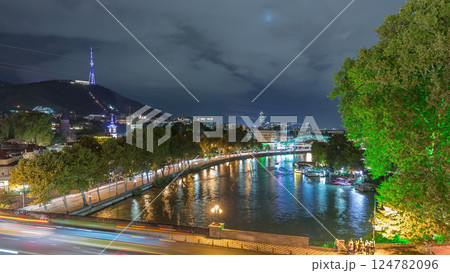 Bridge of Peace night timelapse, a bow-shaped pedestrian bridge in Tbilisi, Georgia 124782096