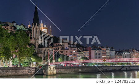 Timelapse hyperlapse of Saint George Church at night, Quais de Saone and Fourviere Basilica from a footbridge in Vieux Lyon, France Timelapse hyperlapse of Saint George Church at night, Quais de Saone and Fourviere Basilica from a footbridge in Vieux Lyon, France 124782212