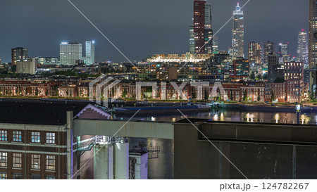 Panoramic night aerial timelapse of Katendrecht peninsula and Maashaven harbour in Rotterdam, The Netherlands. 124782267