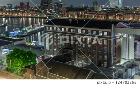 Aerial panoramic view over Maashaven night timelapse in Rotterdam. Netherlands Aerial panoramic view over Maashaven night timelapse in Rotterdam. Netherlands 124782268