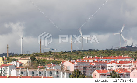 Windmills on a hill for Renewable Electrical Energy timelapse, Wind Farm Utility, Green Electric Power Generation. Windmills on a hill for Renewable Electrical Energy timelapse, Wind Farm Utility, Green Electric Power Generation. 124782449