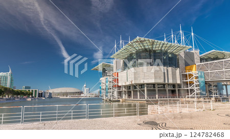 Lisbon oceanarium timelapse hyperlapse building on pier in an artificial lagoon at Tagus river estuary in parque das nacoes Lisbon oceanarium timelapse hyperlapse building on pier in an artificial lagoon at Tagus river estuary in parque das nacoes 124782468