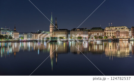 Night timelapse of Binnenalster in Hamburg, Germany, with City Hall and Nikolai Church. 124782537