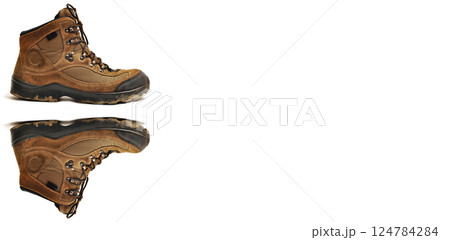 Hiking shoes and a white background, sturdy hiking boots, strong hiking beige and brown boots Hiking shoes and a white background, sturdy hiking boots, strong hiking beige and brown boots 124784284