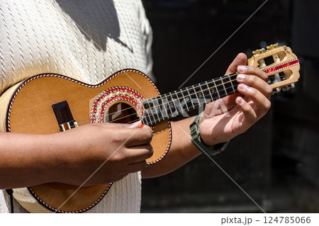 Cavaquinho being played Cavaquinho being played 124785066
