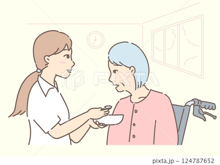 ナーシングホームで食事介助（介護サポート）をする人 124787652