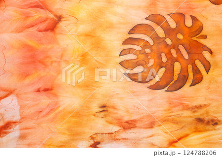 abstract pattern on silk fabric texture in yellow and brown tones 124788206