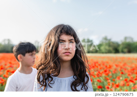 portrait of two girls standing outdoors portrait of two girls standing outdoors 124790675
