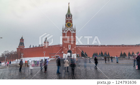 View of The Saviour Spasskaya Tower timelapse hyperlapse and Kremlin walls of Moscow Kremlin, Russia at day in winter. 124791636