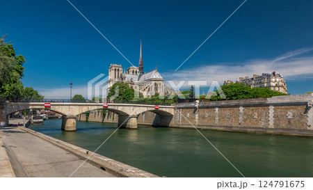 Seine and Notre Dame de Paris timelapse hyperlapse is the one of the most famous symbols of Paris 124791675