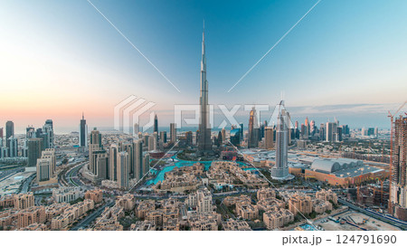 Dubai Downtown day to night timelapse view from the top in Dubai, United Arab Emirates Dubai Downtown day to night timelapse view from the top in Dubai, United Arab Emirates 124791690