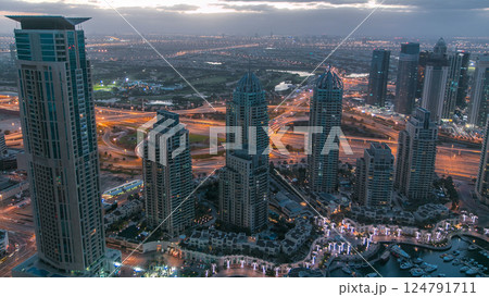 Dubai marina harbor panorama from night to day transition timelapse 124791711