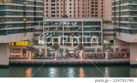 Dubai Marina towers and canal in Dubai day to night timelapse Dubai Marina towers and canal in Dubai day to night timelapse 124791740
