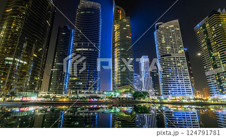Residential buildings in Jumeirah Lake Towers timelapse hyperlapse in Dubai, UAE. 124791781