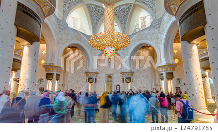 Magnificent interior of Sheikh Zayed Grand Mosque timelapse hyperlapse with crowd in Abu Dhabi. 124791785