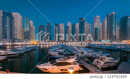 Dubai Marina at Blue hour night to day timelapse with yachts Dubai Marina at Blue hour night to day timelapse with yachts 124791889