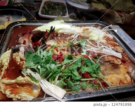 fish baked with vegetables cabbage and peppers and mushrooms fish baked with vegetables cabbage and peppers and mushrooms 124791898