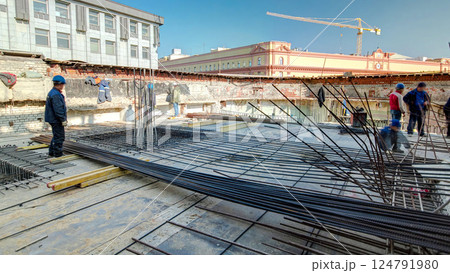 Steel bar rebar metal framework reinforcement for concrete at construction site timelapse. Steel bar rebar metal framework reinforcement for concrete at construction site timelapse. 124791980