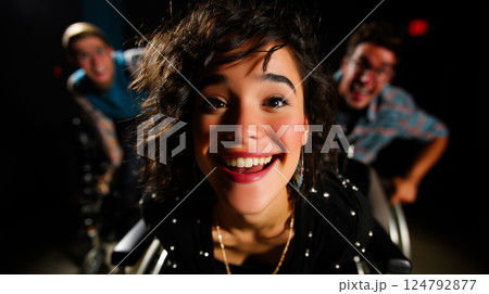 Portrait of a smiling wheelchair user with friends, confident and beautiful, empowering, artistic, inclusivity and friendship 124792877