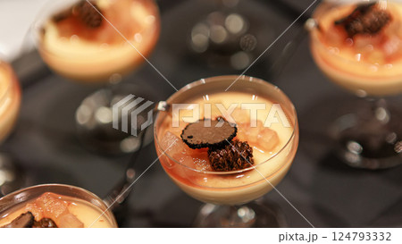 Elegant gourmet dessert served in delicate glassware Elegant gourmet dessert served in delicate glassware 124793332