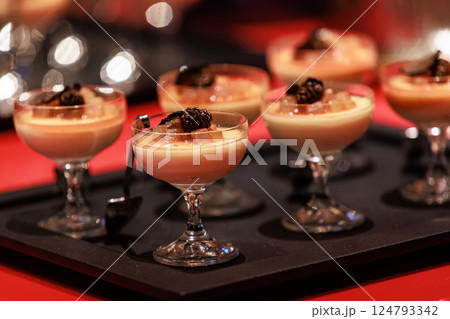 Elegant gourmet dessert served in delicate glassware 124793342