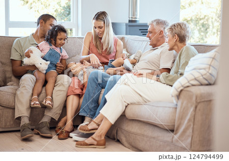 Love, children with grandparents in a big family as mother and father play with kids on the sofa or couch. Dad mom and young kids happy to enjoy bonding with lovely grandmother and senior man in home Love, children with grandparents in a big family as mother and father play with kids on the sofa or couch. Dad mom and young kids happy to enjoy bonding with lovely grandmother and senior man in home 124794499