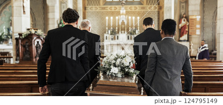Funeral, church and group carry coffin in service, death or sermon for burial with support. Friends, family or pallbearers with casket for respect, help or sorrow in mourning, worship or god religion 124795149