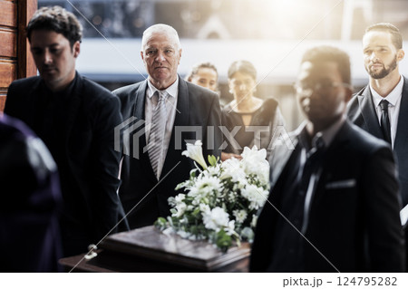 Sad, funeral and people with coffin at church for service, mourning and grief over death. Flowers, depression and ceremony with family carrying casket in chapel for sorrow, support and loss together Sad, funeral and people with coffin at church for service, mourning and grief over death. Flowers, depression and ceremony with family carrying casket in chapel for sorrow, support and loss together 124795282