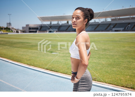 Sports, runner and portrait of woman in stadium ready for training, exercise or workout. Fitness, health or black female athlete on outdoors race track preparing for running, marathon or olympic race 124795974