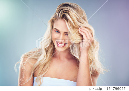 Hair care, beauty and woman with a hairstyle in a studio for keratin, brazilian or volume treatment. Happy, smile and girl model with long, healthy and beautiful hair isolated by gradient background. 124796025
