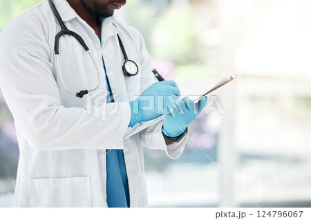 Healthcare, paper and doctor writing in a hospital, insurance and compliance form before surgery. Hands, medical and record by health worker write clipboard note, prescription and medicine planning Healthcare, paper and doctor writing in a hospital, insurance and compliance form before surgery. Hands, medical and record by health worker write clipboard note, prescription and medicine planning 124796067