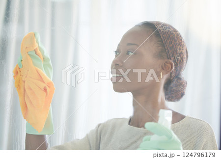 Cleaning, window and black woman with spray and cloth for dust, bacteria and housekeeping service. Disinfection, hygiene and cleaner with girl and glass surface at home for washing, germs or sanitize Cleaning, window and black woman with spray and cloth for dust, bacteria and housekeeping service. Disinfection, hygiene and cleaner with girl and glass surface at home for washing, germs or sanitize 124796179