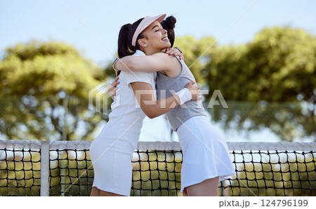 Tennis court, hug or fitness women in celebration, success and congratulations from workout game, training match or exercise competition. Smile, happy or embrace tennis players in winner partnership 124796199