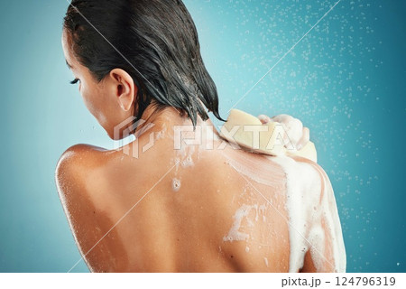 Water, soap shower and cleaning of a woman for hygiene and washing with cosmetic sponge. Person in a bathroom using foam to clean body, skin and hair for skincare wellness and natural beauty Water, soap shower and cleaning of a woman for hygiene and washing with cosmetic sponge. Person in a bathroom using foam to clean body, skin and hair for skincare wellness and natural beauty 124796319