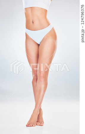 Beauty, health and body of a woman in studio for wellness, skincare and hair removal routine. Shaving, grooming and healthy slim model with dermatology skin treatment isolated by white background. Beauty, health and body of a woman in studio for wellness, skincare and hair removal routine. Shaving, grooming and healthy slim model with dermatology skin treatment isolated by white background. 124796376