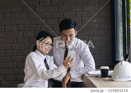 construction business plan deconstruction team consulting partnership. Construction engineer teamwork Safety Suit Trust Team implement honest planning in Construction Site. Trustworthy engineer team. 124803219