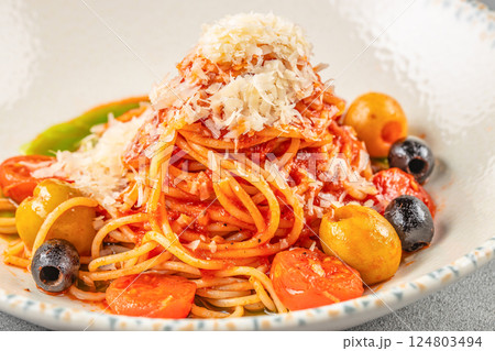 delicious classic tomato sauce and basil spaghetti, italian pasta, mediterranean meal. Food recipe background. Close up. top view delicious classic tomato sauce and basil spaghetti, italian pasta, mediterranean meal. Food recipe background. Close up. top view 124803494