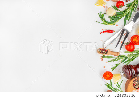 composition with ingredients for cooking, Herbs and condiments on light background. Top view, copy space 124803516