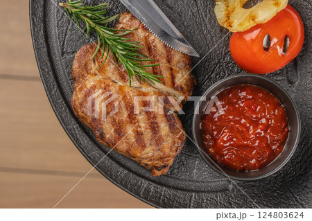 grilled pork steak with grilled vegetables. top view. copy space grilled pork steak with grilled vegetables. top view. copy space 124803624