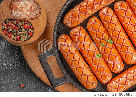 Grilled sausage on a dark background. top view. copy space for text 124803690