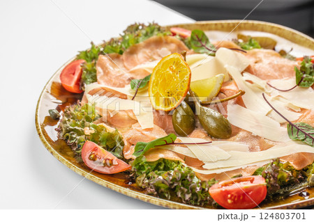 Salmon carpaccio, salad salmon appetizer served on a plate, copy space, top view Salmon carpaccio, salad salmon appetizer served on a plate, copy space, top view 124803701