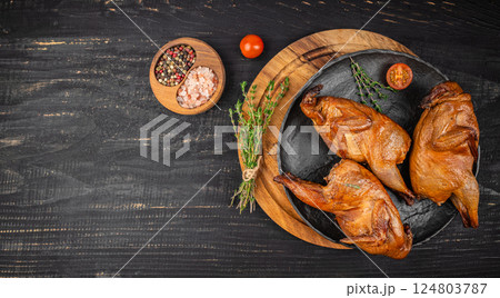 smoked quail, Delicious meat with spices and herbs. Long banner format. top view. copy space smoked quail, Delicious meat with spices and herbs. Long banner format. top view. copy space 124803787