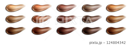 Foundation drops kit with various dark skin tones. 124804342
