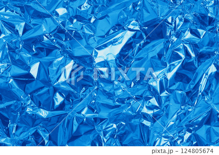 Blue foil leaf shiny texture, abstract wrapping paper for background and design art work. Blue foil leaf shiny texture, abstract wrapping paper for background and design art work. 124805674