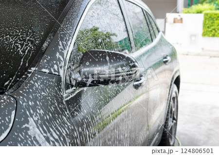 car cleaning and washing with foam soap car cleaning and washing with foam soap 124806501