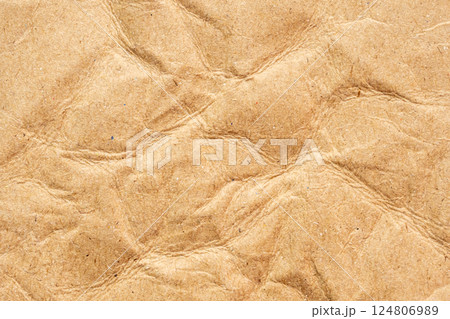 Abstract crumpled and creased recycle brown paper texture background 124806989