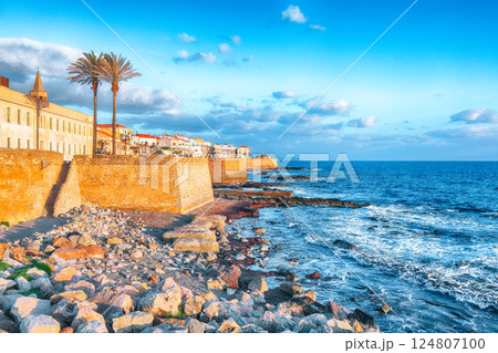 Amazing evening cityscape of historical part of Alghero town. 124807100