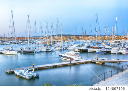 Unbelivable evening view of Alghero port . Mediterranean seascape. Unbelivable evening view of Alghero port . Mediterranean seascape. 124807106