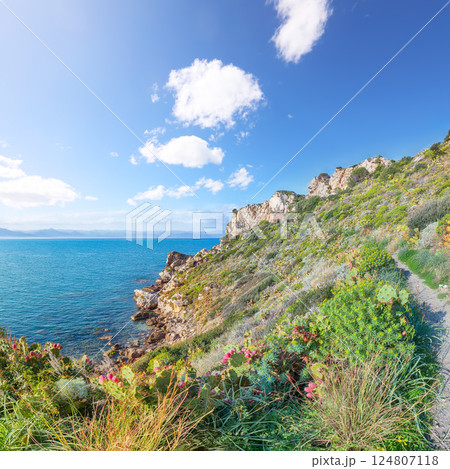 Picturesque spring view on the the cape Milazzo panorama of nature reserve Piscina di Venere. 124807118