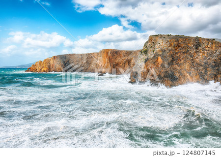 Unbelivable view of cliffs in valley Cala Domestica  and storm on the sea 124807145